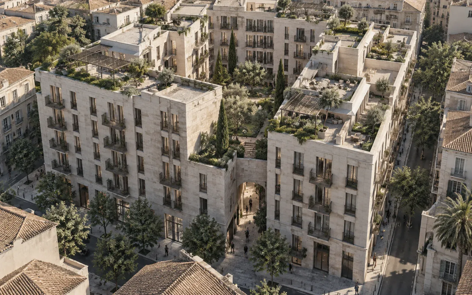 Aerial urban render of a dense block with a pedestrian passage leading to a shared courtyard.