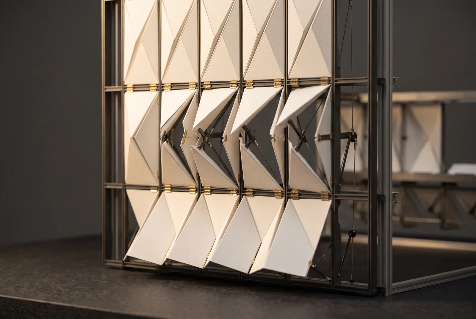 Illustrative mockup model: folding kinetic panels with hinges and actuators
